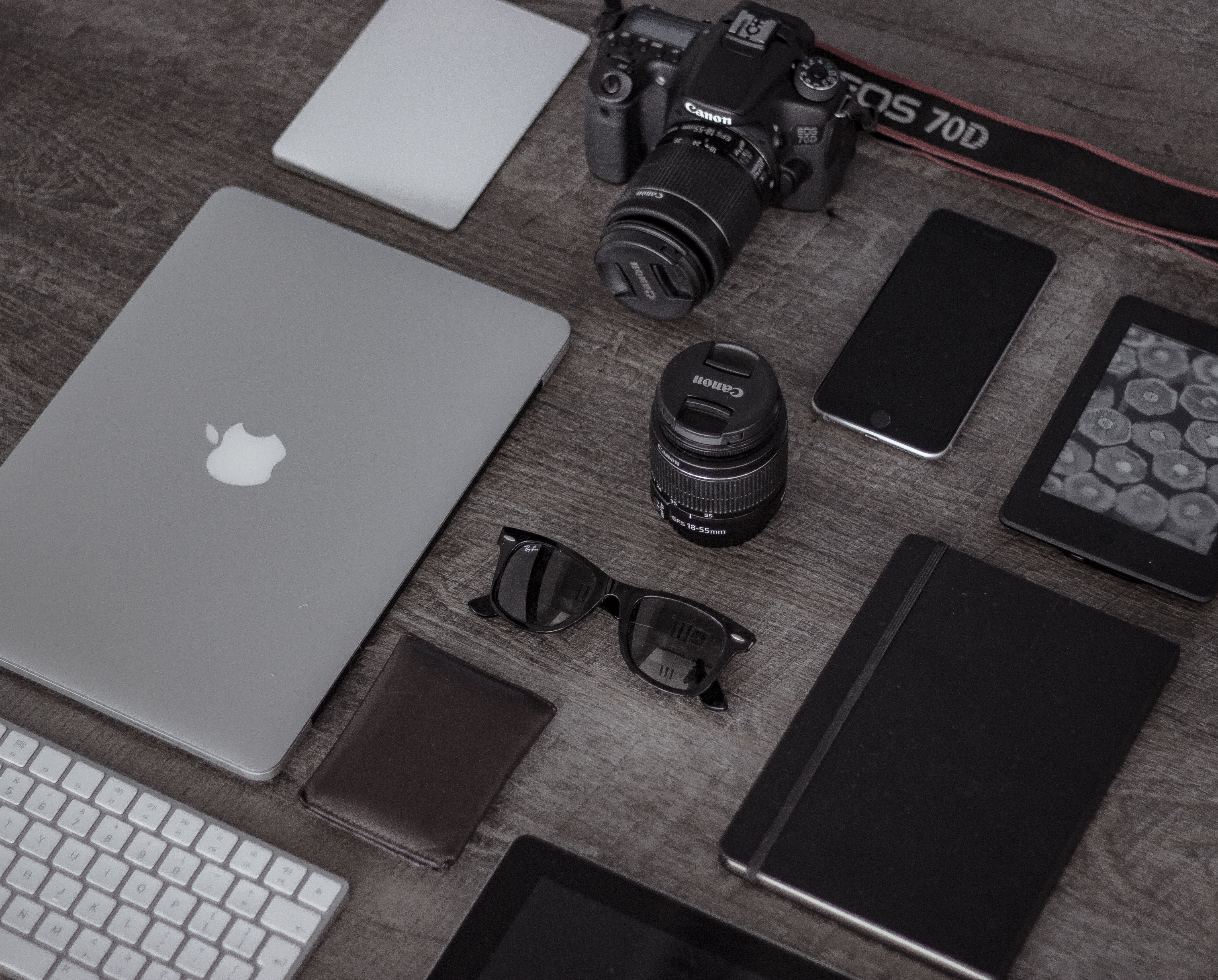 Modern Apple workplace setup with MacBook Air, iPhone and Apple Watch on one table