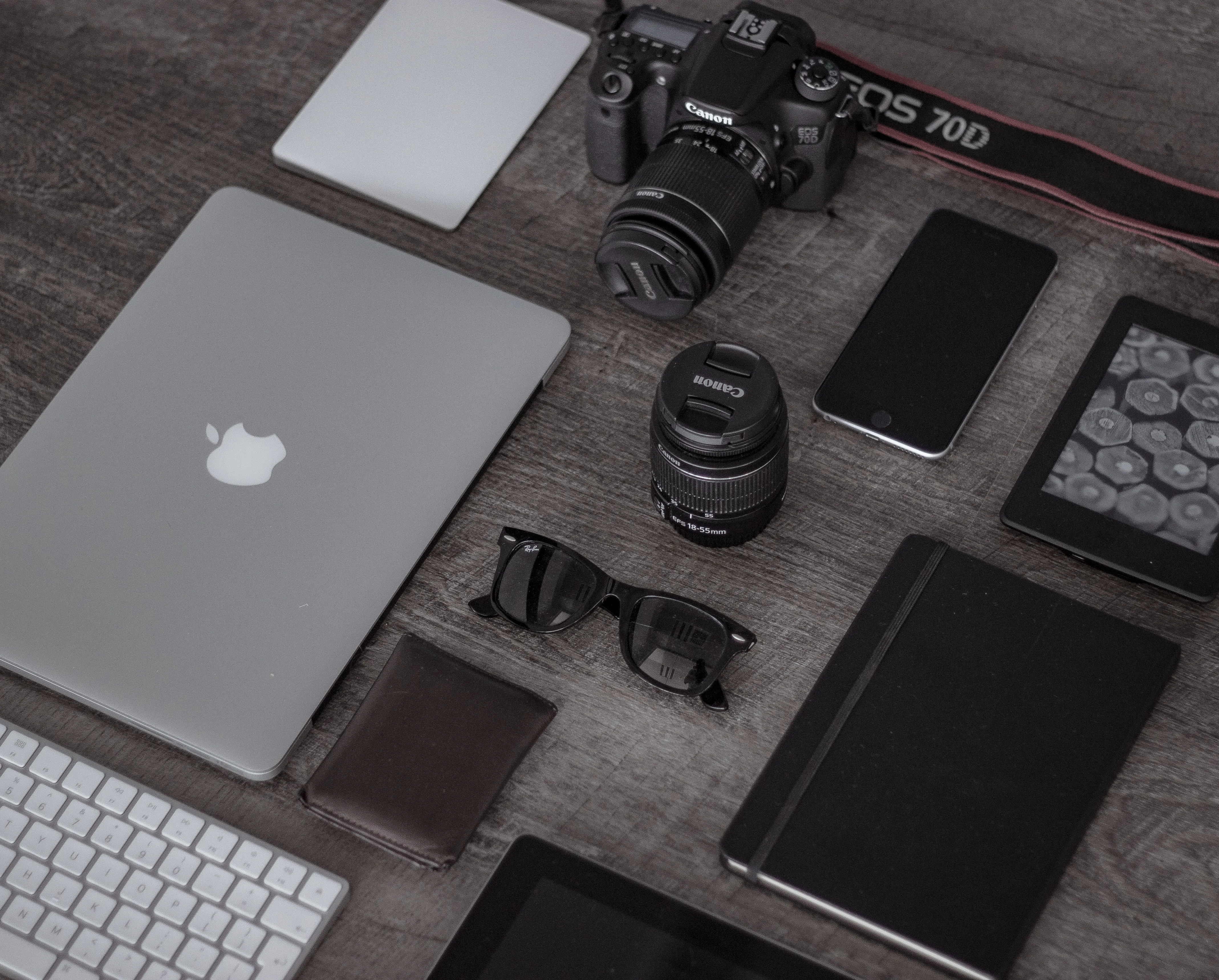 Modern Apple workplace setup with MacBook Air, iPhone and Apple Watch on one table