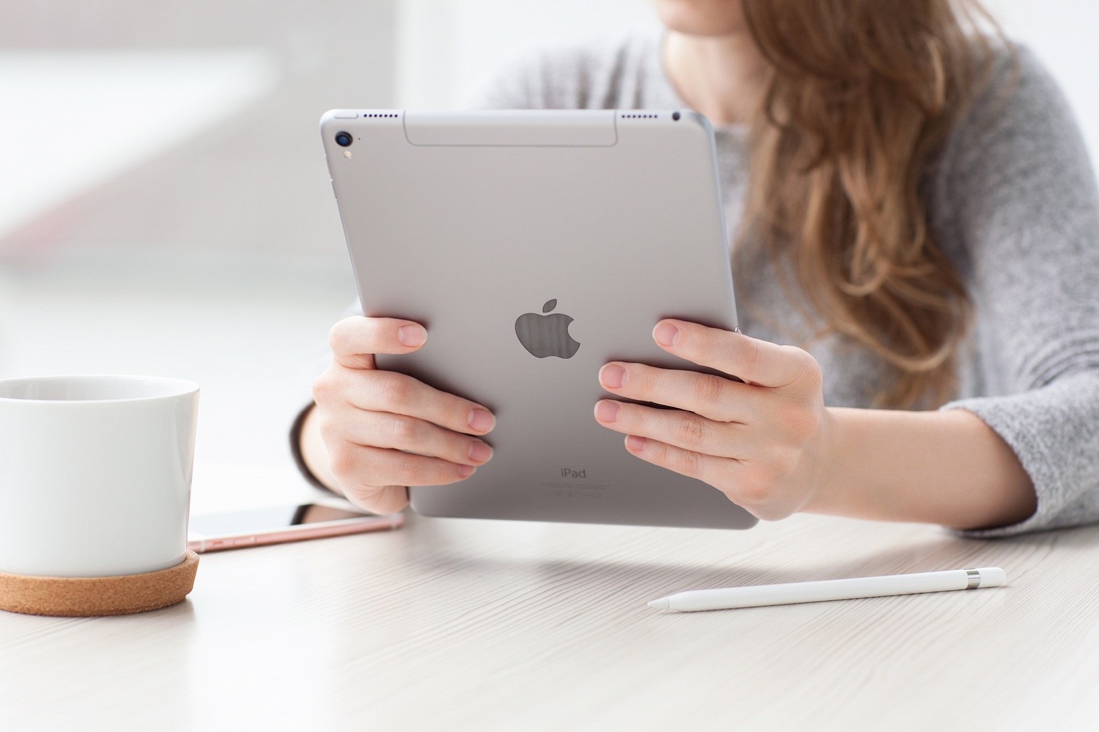 Alushta Russia - May 29 2016: Woman holding in the hand a new iPad Pro Space Gray. iPad Pro was created and developed by the Apple inc.