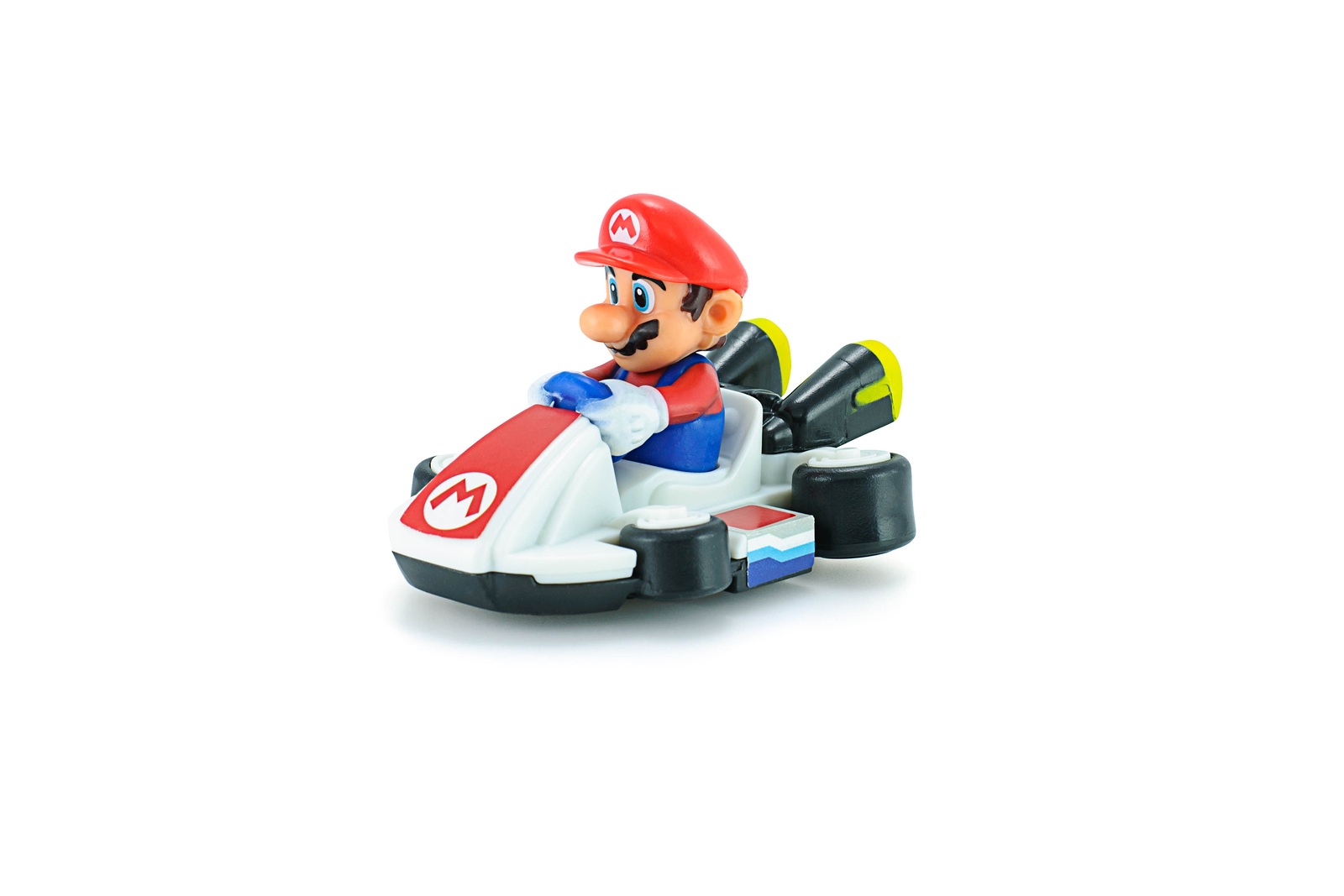 Bangkok, Thailand - May 12, 2015: Super Mario kart figure toy on white background. There are plastic toys sold as part of the McDonald's Happy meals.