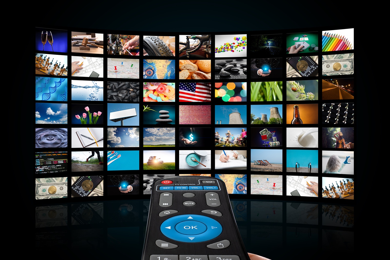 TV with pictures of smart television and remote control, close up.