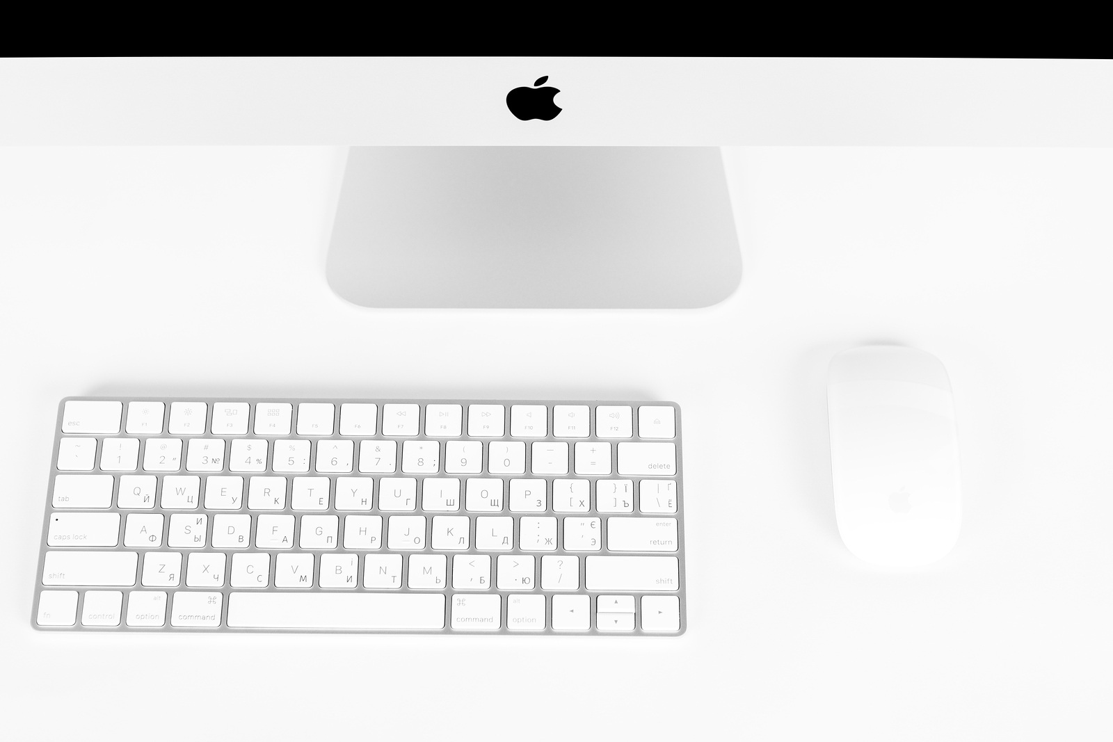 UKRAINE, RIVNE, March 4, 2019. Apple Computer iMac 27 retina display 5K keyboard and magic mouse isolated on a white background