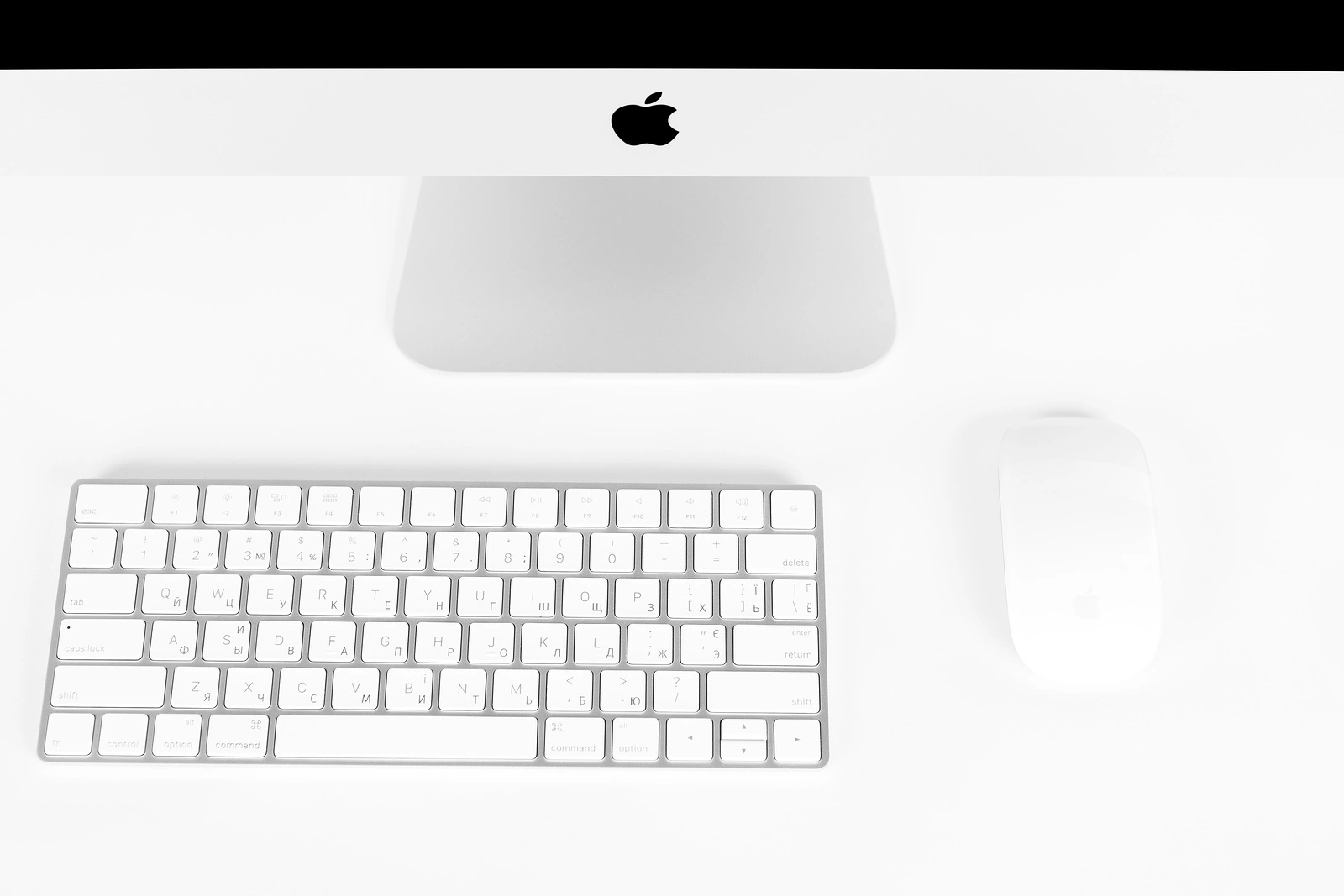 UKRAINE, RIVNE, March 4, 2019. Apple Computer iMac 27 retina display 5K keyboard and magic mouse isolated on a white background