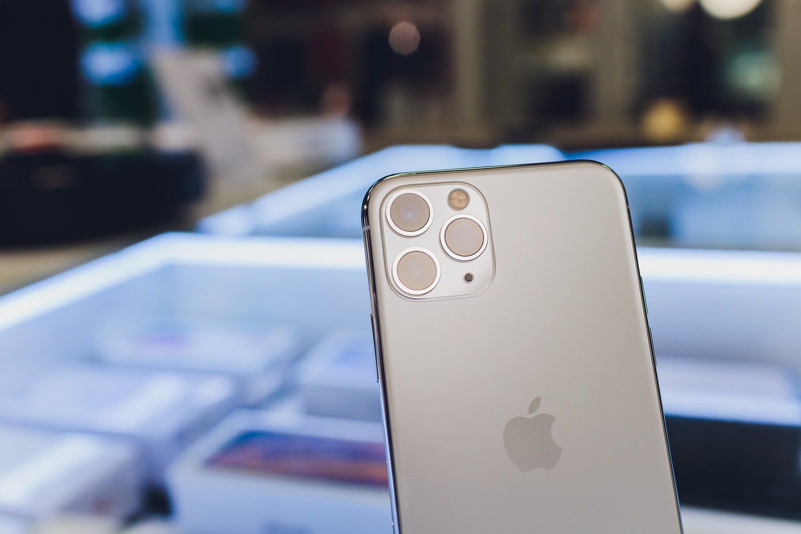 Ufa, Russia, September 24, 2019: The iPhone 11, 11 Pro and Pro Max are displayed as the smartphone by Apple Computers goes on sale rear view of triple-camera.