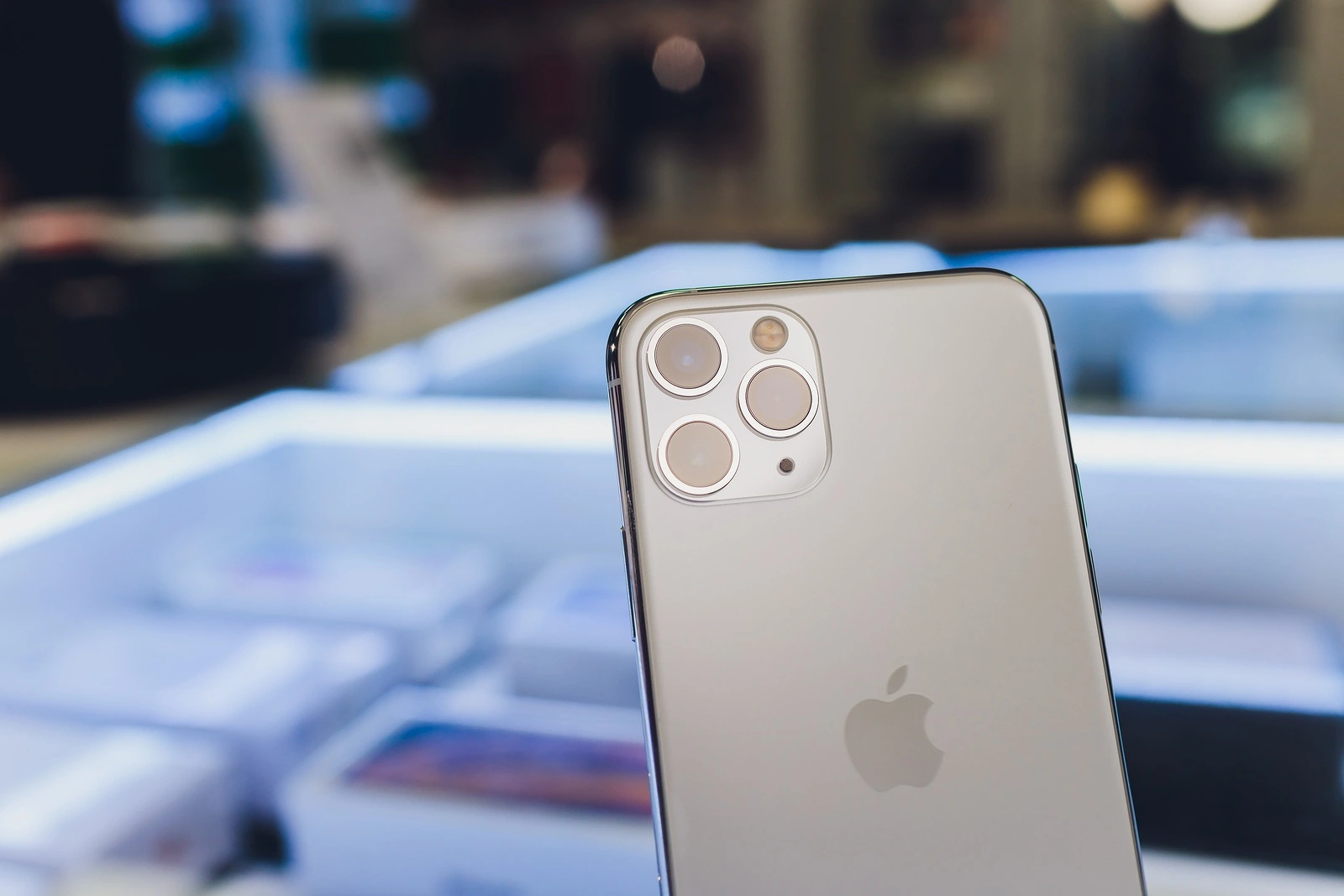 Ufa, Russia, September 24, 2019: The iPhone 11, 11 Pro and Pro Max are displayed as the smartphone by Apple Computers goes on sale rear view of triple-camera.