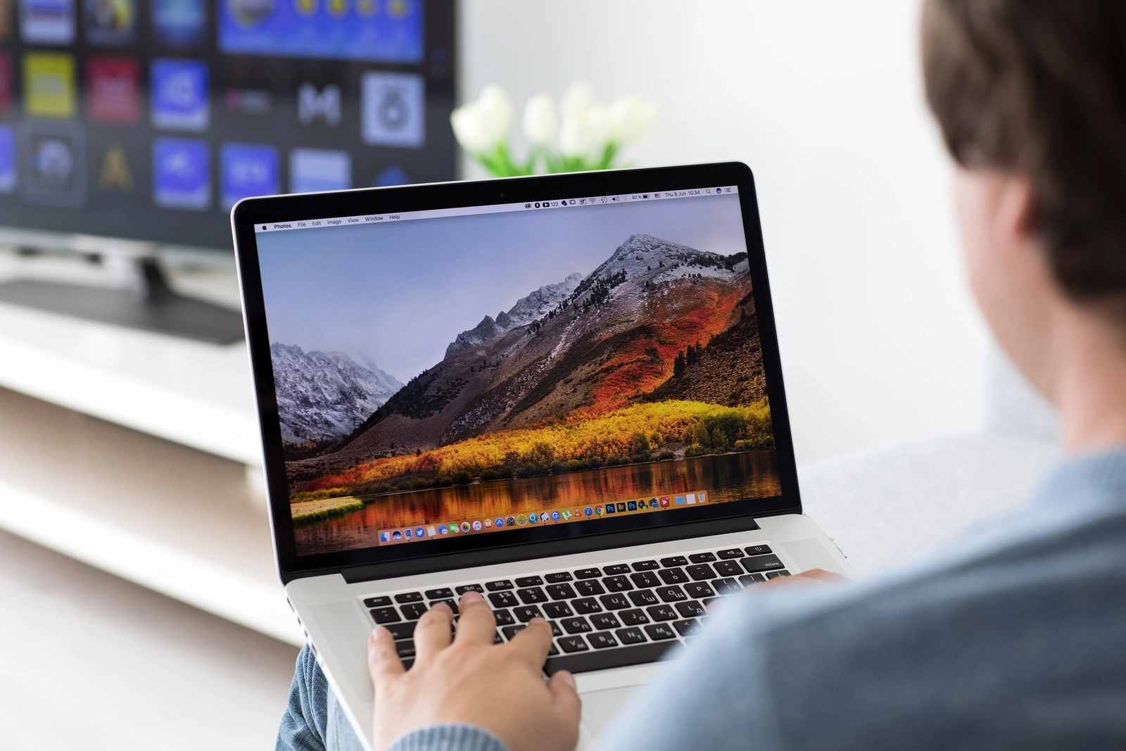 Alushta Russia - June 8 2017: Backgrounds MacOS High Sierra in the screen of MacBook Pro. MacBookPro was created and developed by the Apple inc.