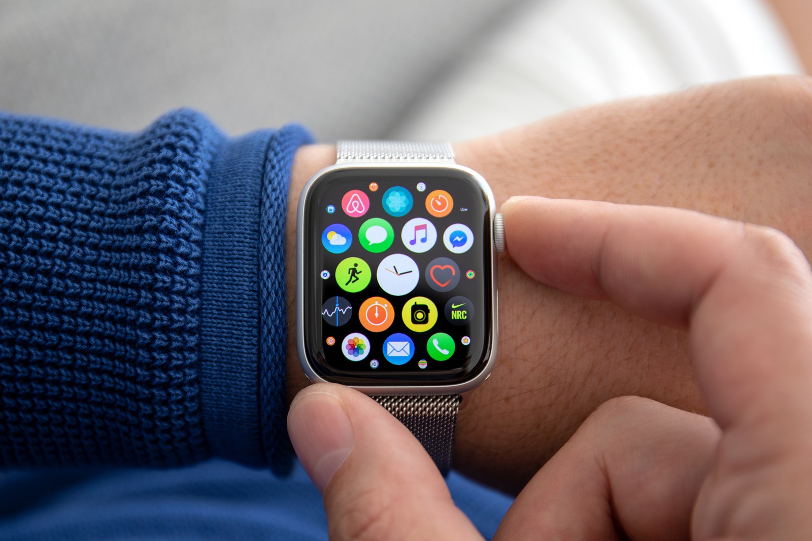 Alushta, Russia - November 3, 2018: Man hand with Apple Watch Series 4 in the home. Apple Watch was created and developed by the Apple inc.