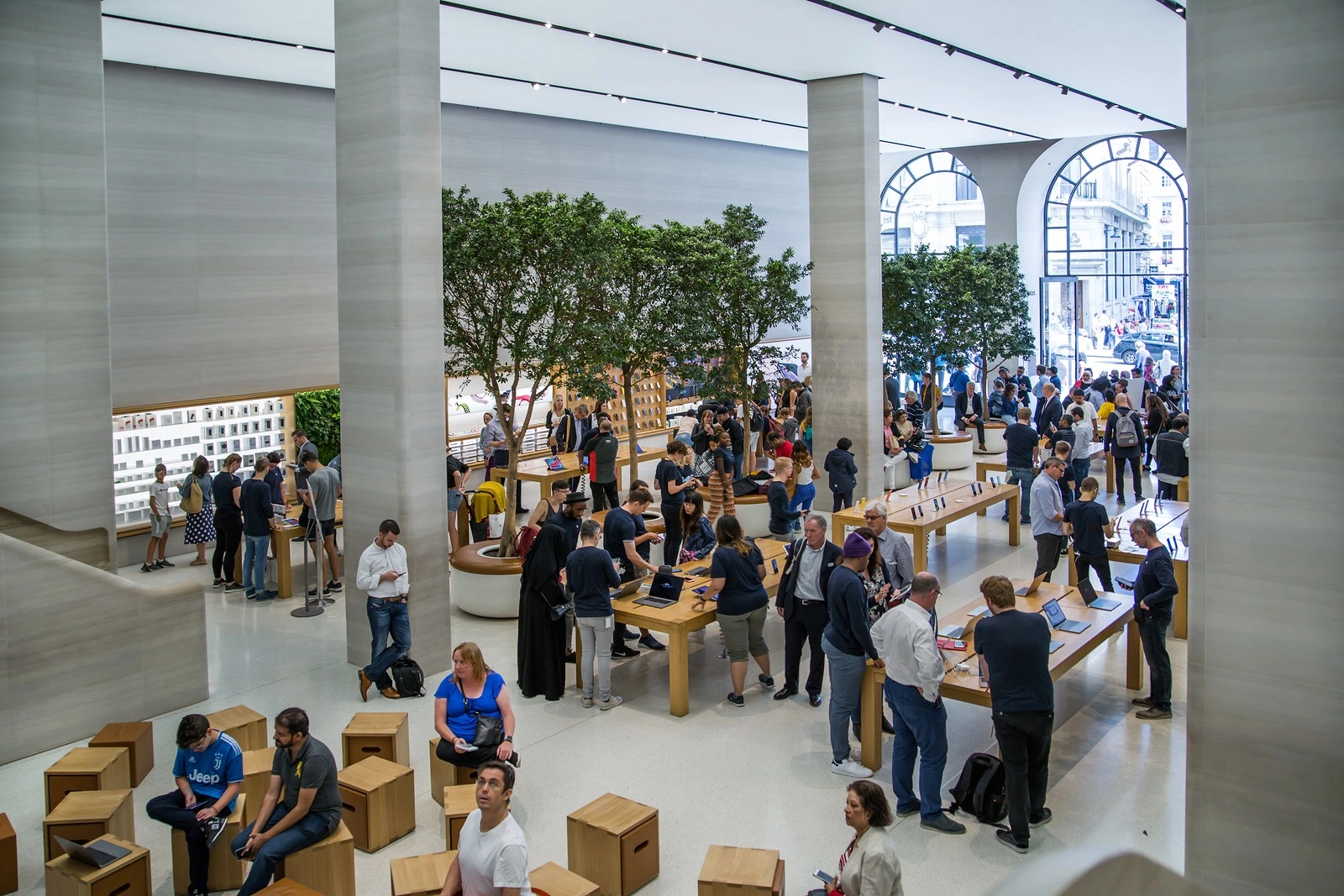 London, UK - August 13, 2019: Interior of the Apple stope. Lots of people inside the Apple Store on Regent Street, Regent Street was Apple's first store in Europe.