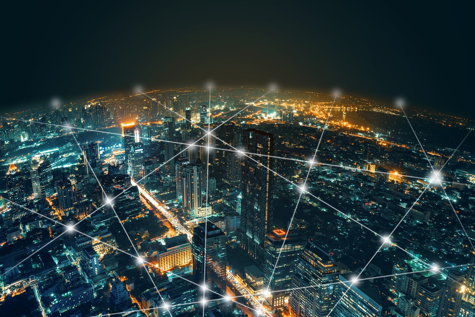 Network and connection technology night city background at business center bangkok thailand. Wireless skyline connection with energy light infographic.