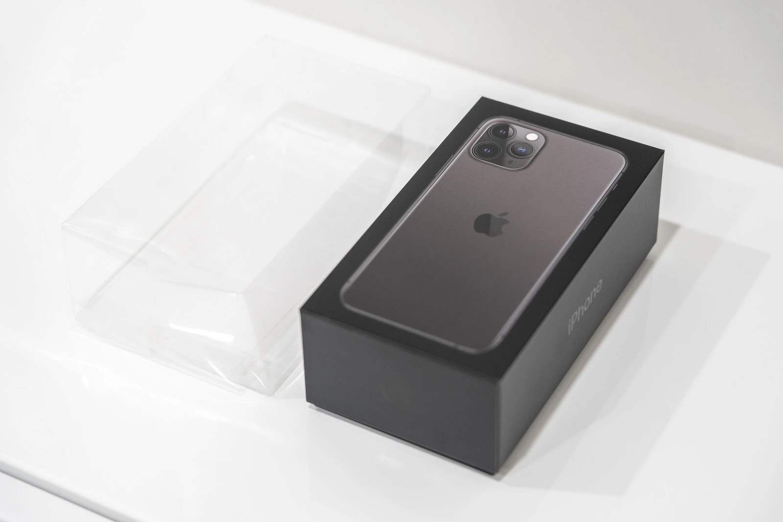 Moscow, Russia - September 24, 2019: New Apple iPhone 11 pro sealed in box over white background