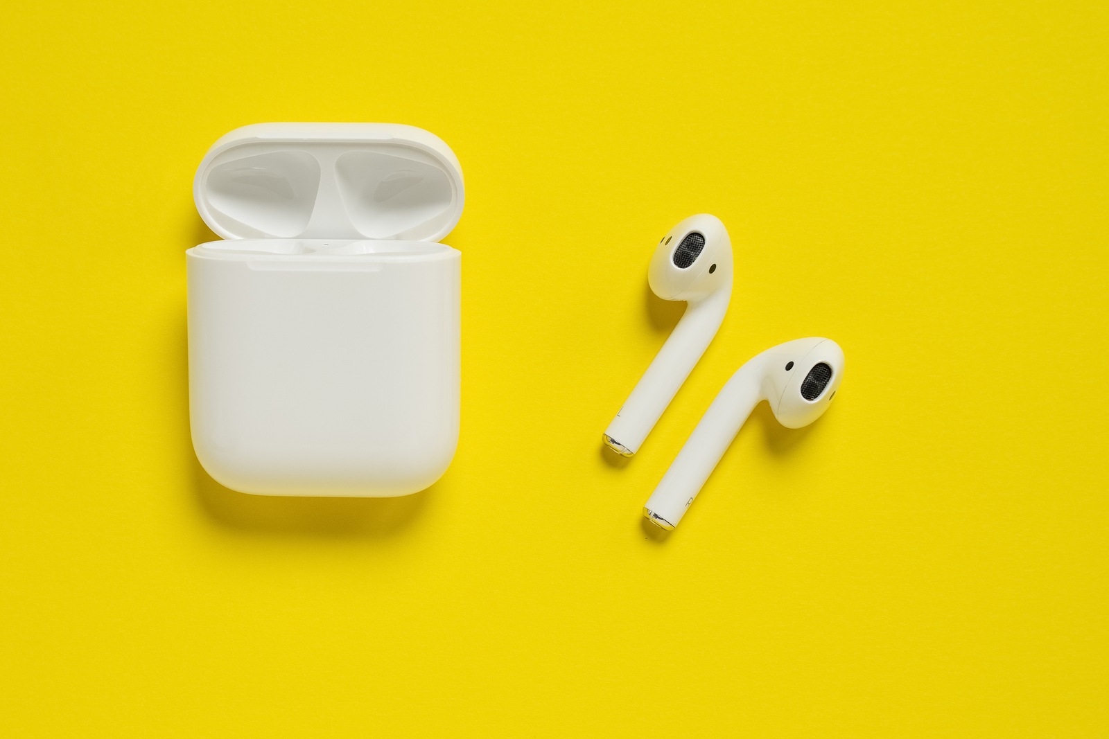 ROSTOV-ON-DON, RUSSIA - October 07, 2019: Apple AirPods wireless Bluetooth headphones and charging case for Apple iPhone. New Apple Earpods Airpods in box.