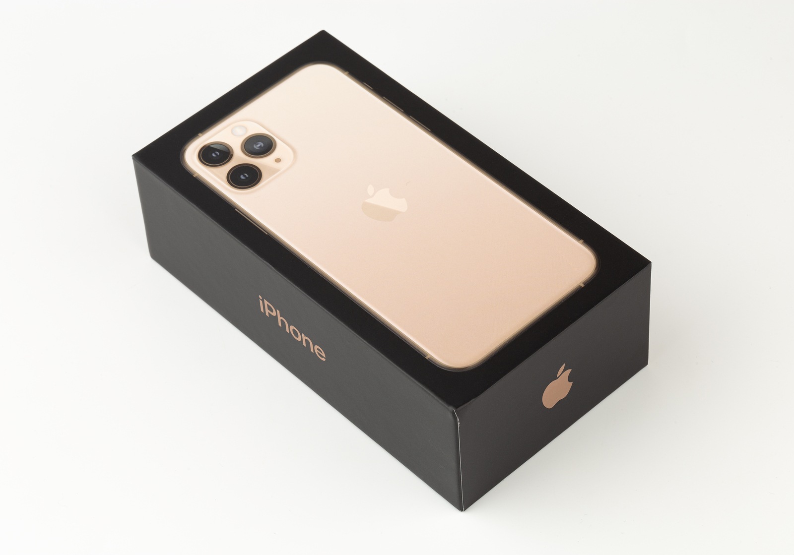 Rostov-on-Don, Russia - October 2019. Apple iPhone 11 Pro on a white background. New smartphone from the company Apple close-up.Smartphone and box from it on a white background.
