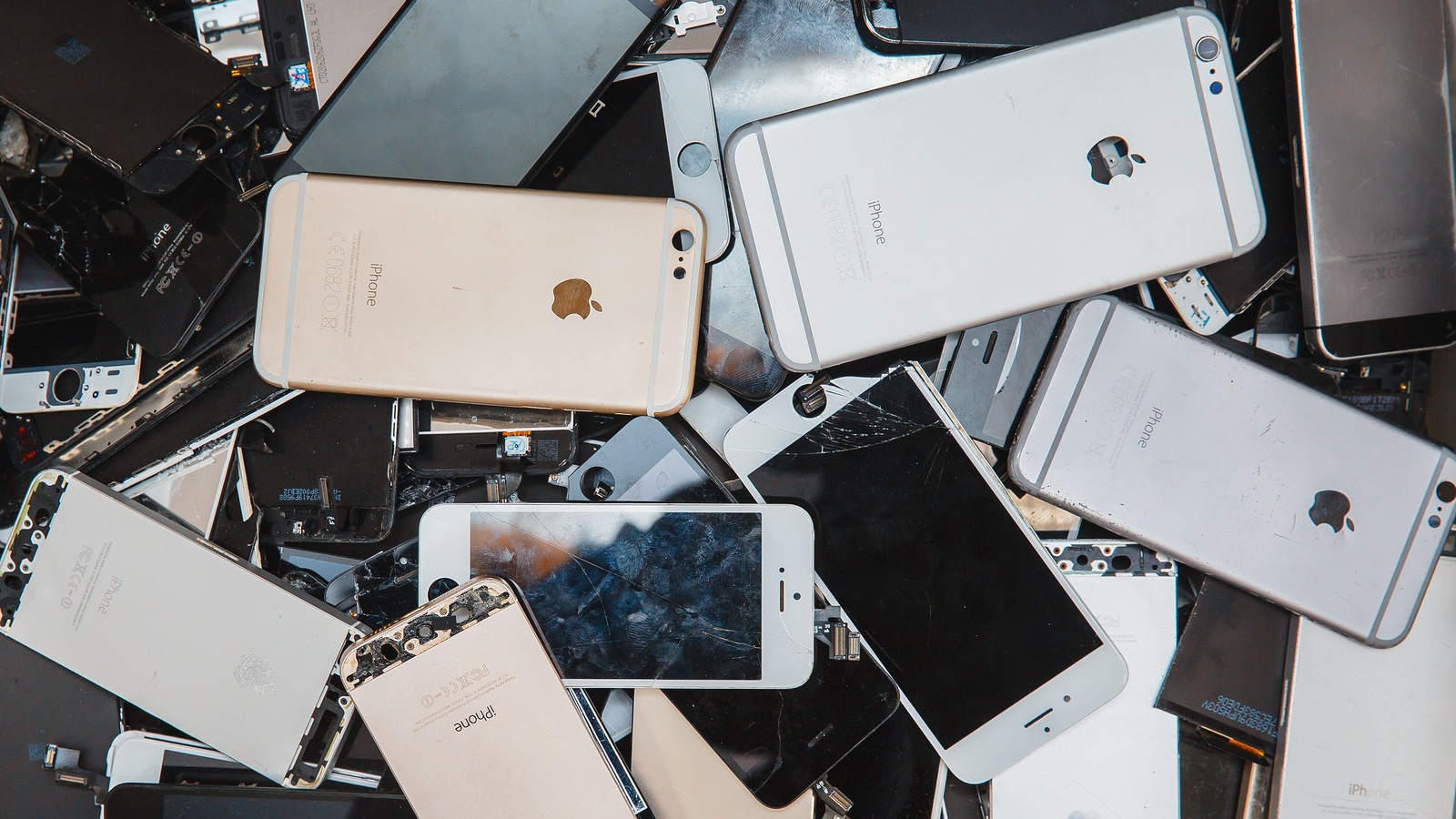 TOMSK, RUSSIA - November 29, 2017: broken panels and screens of iPhone phones lie in the service and are preparing for recycling and disposal