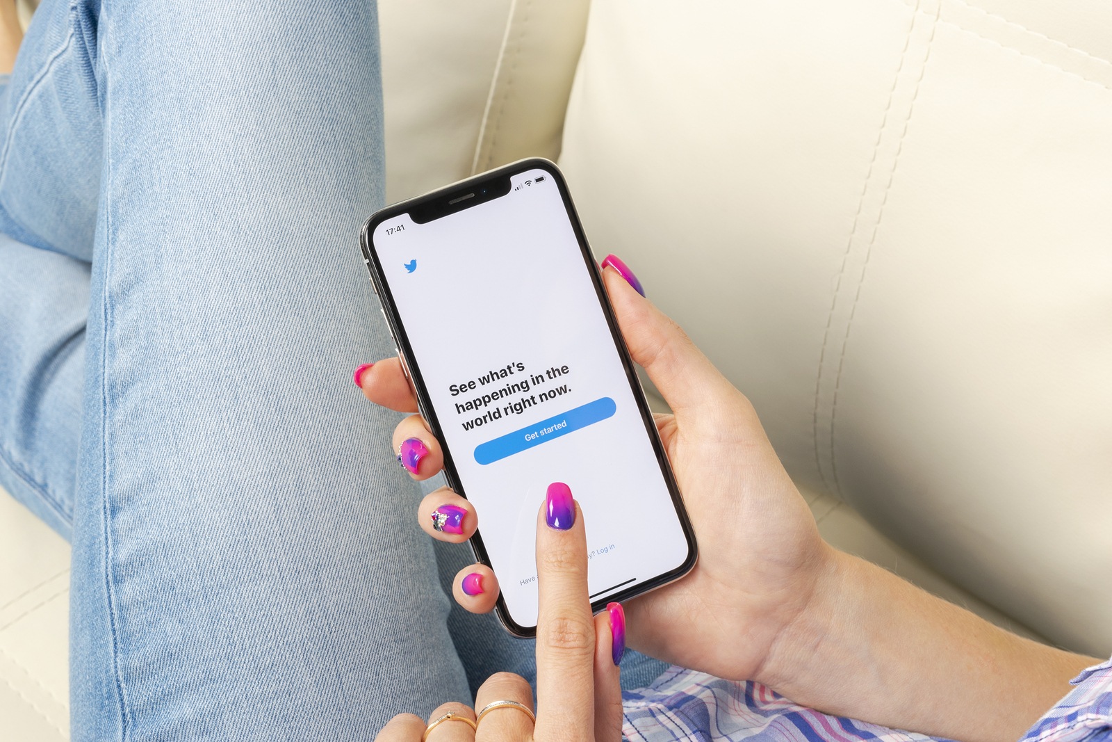 Sankt-Petersburg, Russia, May 30, 2018: Twitter application icon on Apple iPhone X smartphone screen close-up in woman hands. Twitter app icon. Social media icon. Social networks