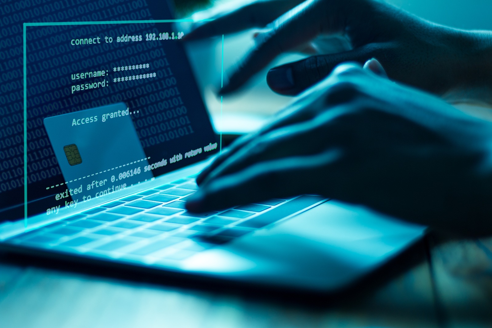 The concept of credit card theft. Hackers with credit cards on laptops use these data for unauthorized shopping. Unauthorized payments from credit card owners. In the hacker's secret office