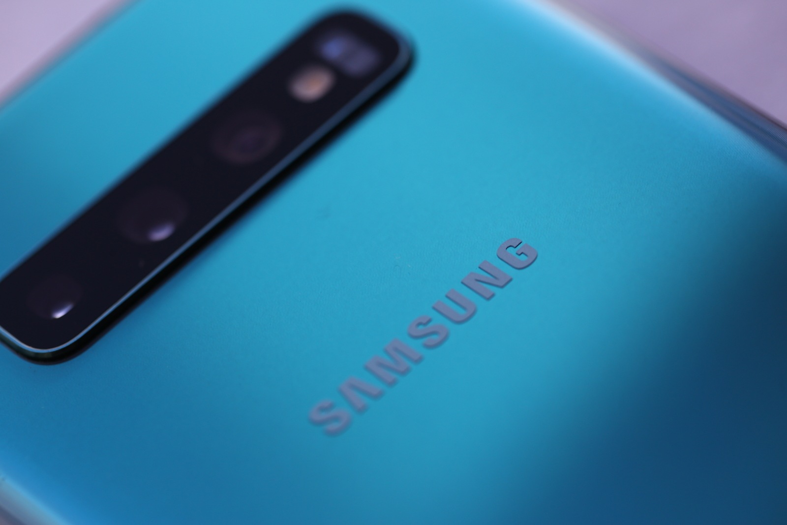 Minsk, Belarus - March 8, 2019 : Smartphone Samsung Galaxy S 10 aquamarine color Illustrative editorial