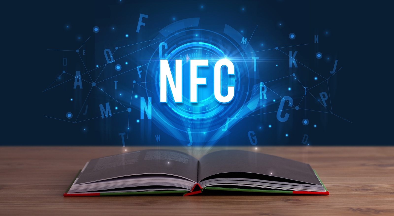 NFC inscription coming out from an open book, digital technology concept