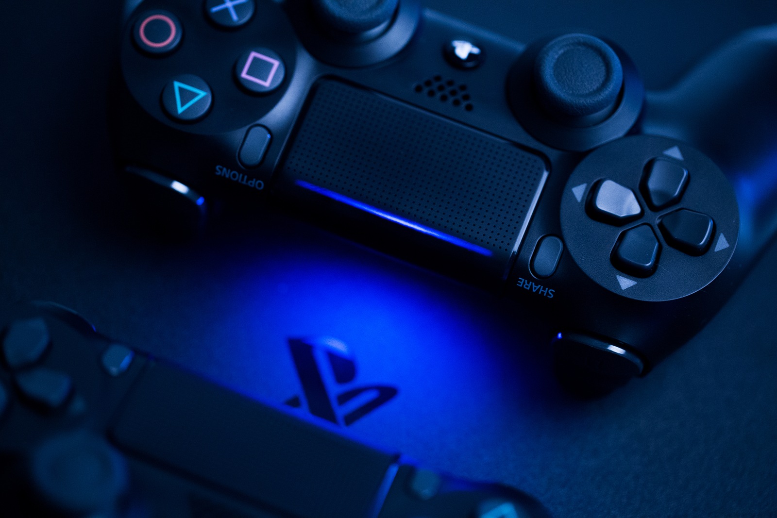 Russia, OCTOBER 24 2019: The new Sony Dualshock 4 with PlayStation 4. Sony PlayStation 4 game console of the eighth generation.