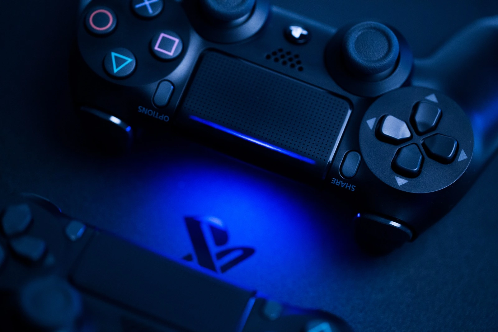Russia, OCTOBER 24 2019: The new Sony Dualshock 4 with PlayStation 4. Sony PlayStation 4 game console of the eighth generation.