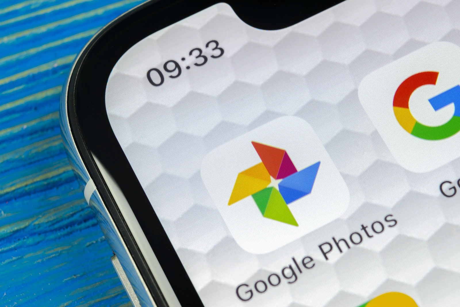 Saint-Petersburg, Russia, June 20, 2018: Google Photos plus application icon on Apple iPhone X screen close-up. Google plus Photos icon. Google photos application. Social media network