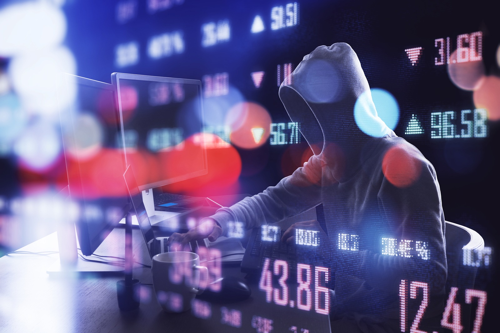 Hacker using computer and business statistics hologram. Hacking and cyber attack concept.