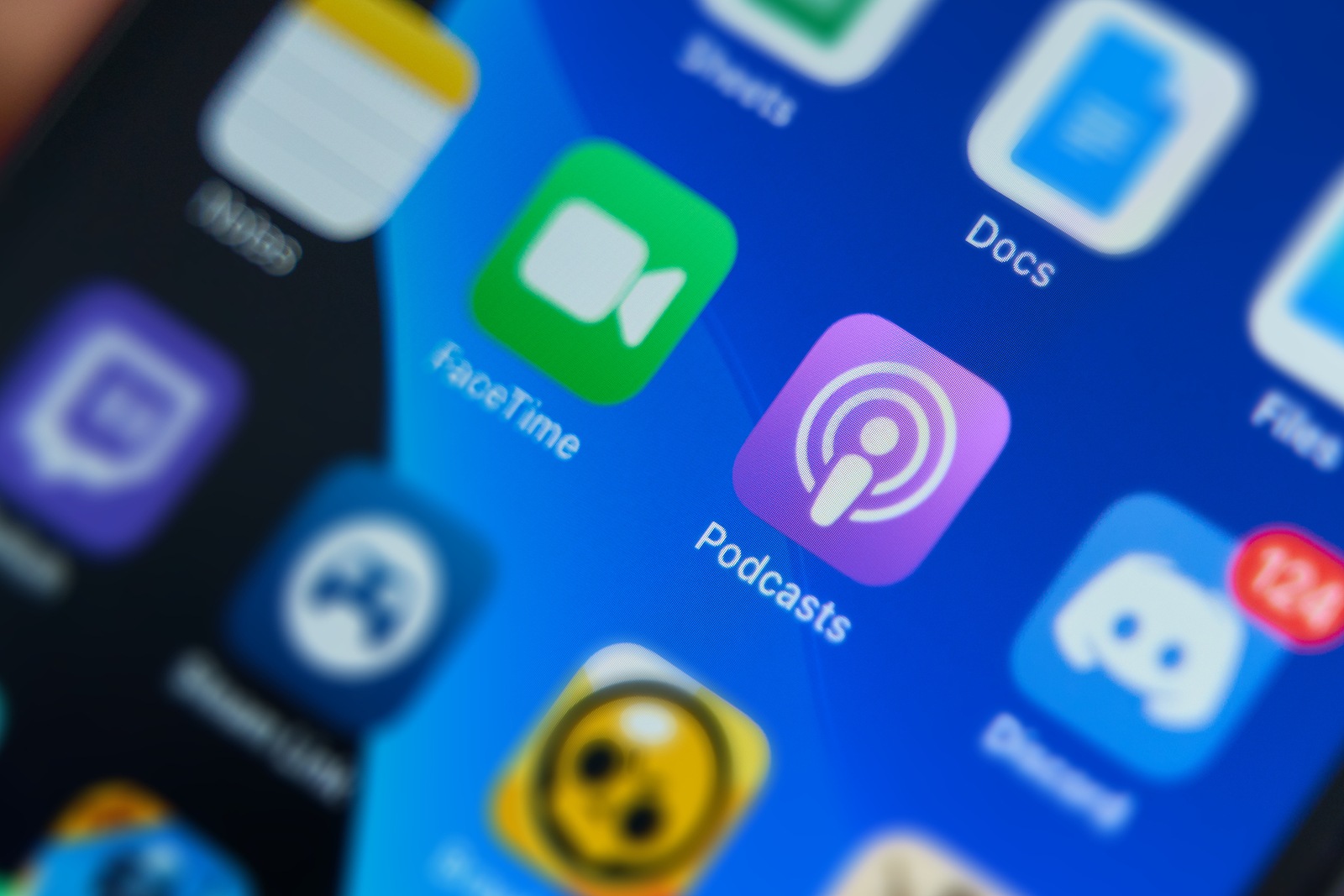 Bishkek, Kyrgyzstan - June 6, 2019: Close up to Apple Podcasts app on the screen of an iPhone
