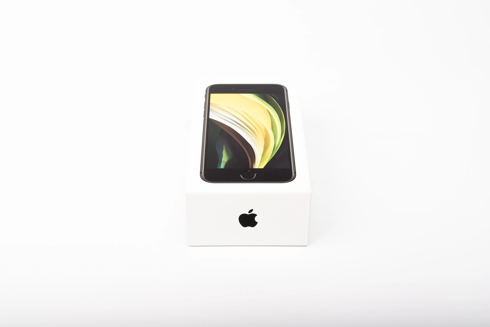 Paris, France - May 14, 2020: Packaging of the new black iPhone SE 2020 from the multinational company Apple during the days of its studio release on a white background