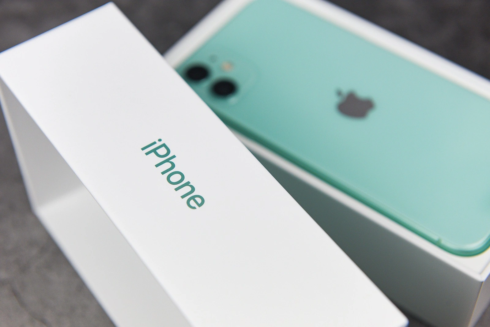 Bangkok, Thailand - November 30, 2019 : Smartphone New iPhone 11 green color and package box modern 2019 mobile phones / Buy a new mobile phone concept