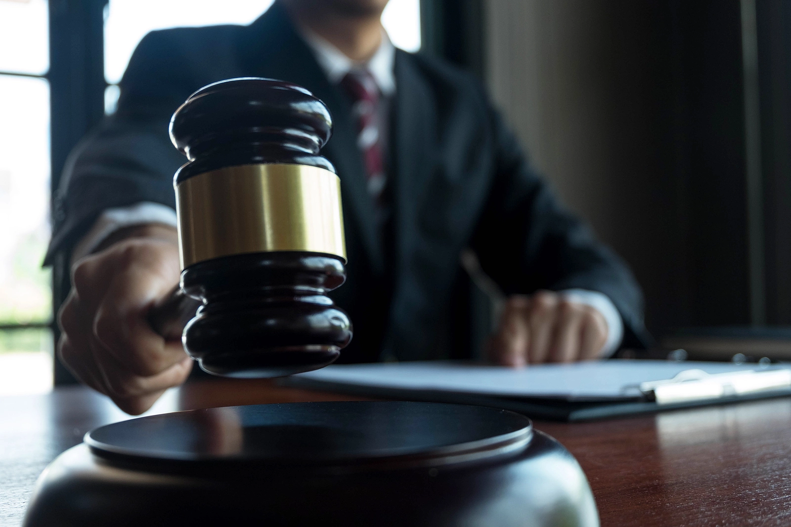 Judge with gavel on table. attorney, court judge, tribunal and justice concept.
