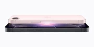 Symbolic image for the iPhone 18e rumors: two entry-level iPhones stacked flat, the pink back with a single camera on top and a black housing with a glowing display below