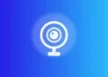 Apple Security Camera: illustrated ring camera on a stand, blue gradient