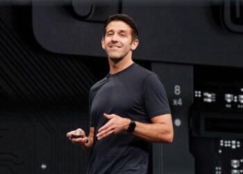 John Ternus on stage at an Apple keynote, with Laura Legros returning to its leadership team.