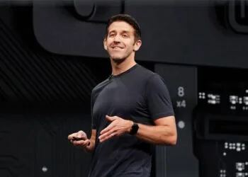 John Ternus on stage at an Apple keynote, with Laura Legros returning to its leadership team.