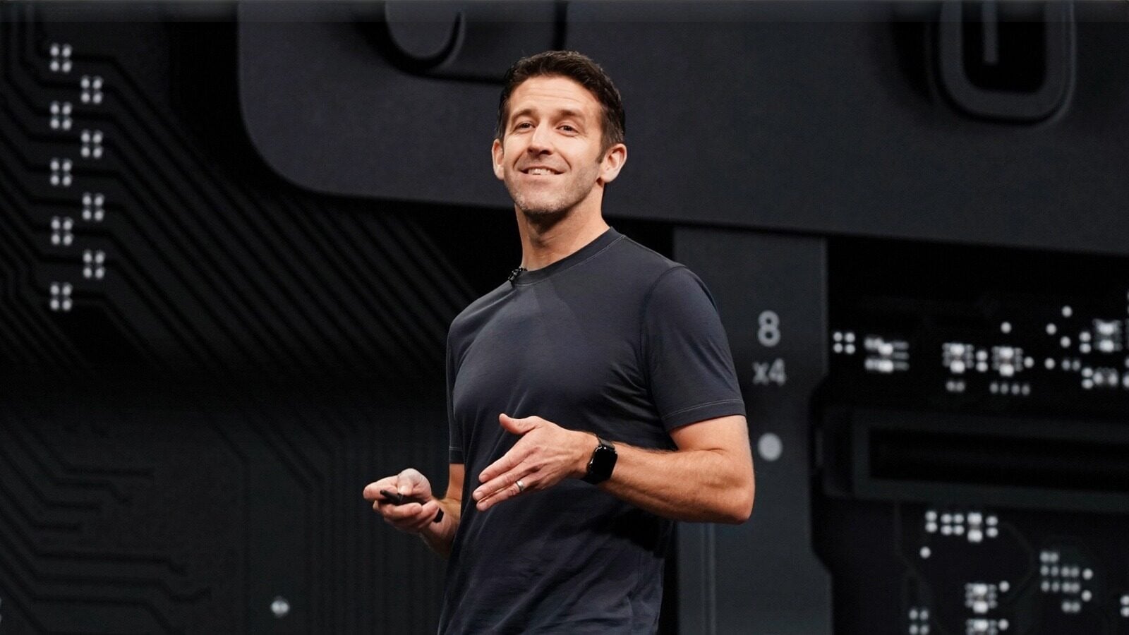 John Ternus on stage at an Apple keynote, with Laura Legros returning to its leadership team.