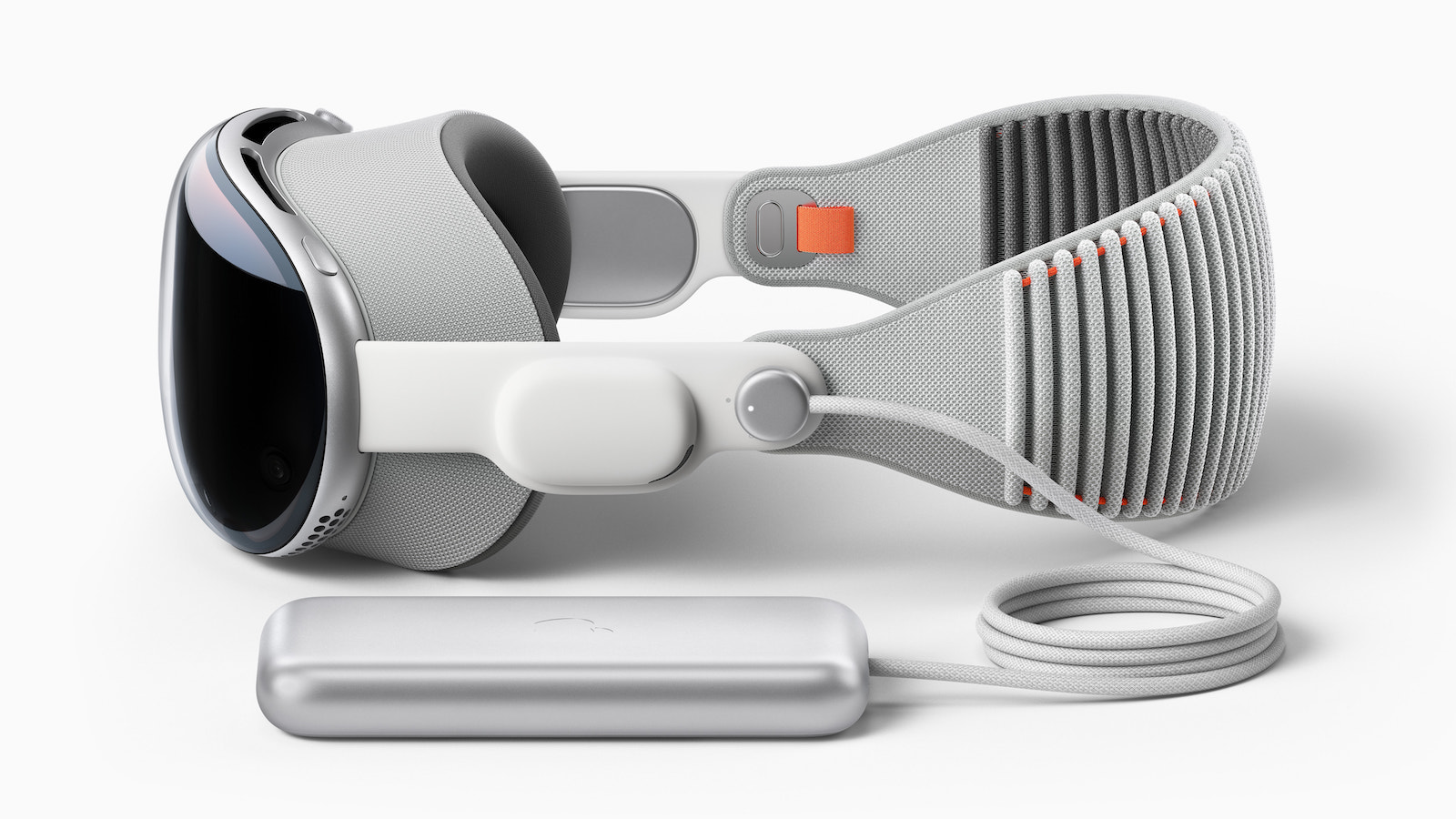 Apple Vision Pro with head band and external battery on a light background, the headset is now also being used in the operating room