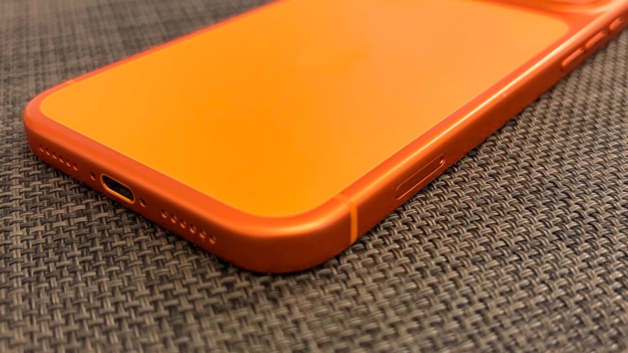 Bottom edge of an orange iPhone 17 Pro Max, whose successor is expected to get the A20 Pro