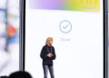 Jennifer Bailey on stage at an Apple event in front of a projected Apple Card, the Apple Pay chief is leaving the company in October