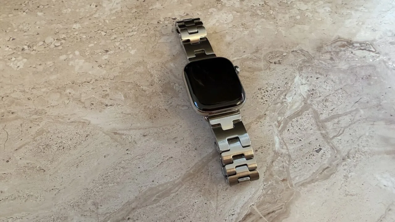 Apple Watch with link bracelet on light stone – the Apple Watch Series 12 is set to track heart rate continuously