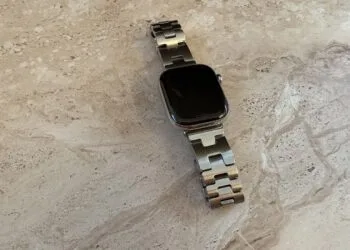 Apple Watch with link bracelet on light stone – the Apple Watch Series 12 is set to track heart rate continuously