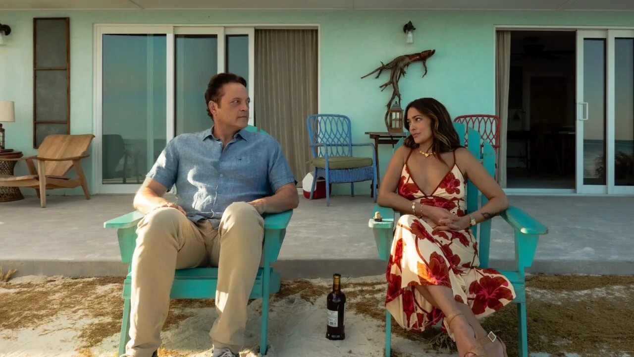 Vince Vaughn and Natalie Martinez in Bad Monkey season two outside a Florida beach house