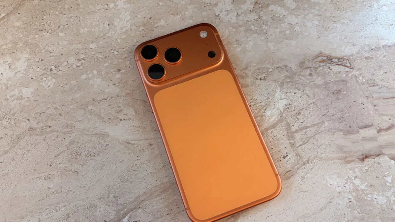iPhone 17 Pro in Cosmic Orange on marble as a reference point for the iPhone 18 Pro price