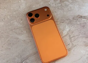iPhone 17 Pro in Cosmic Orange on marble as a reference point for the iPhone 18 Pro price