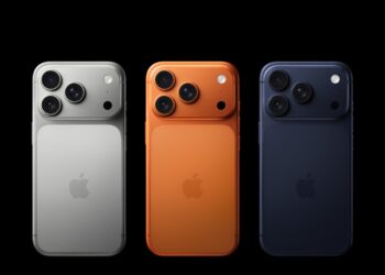 Three iPhone 17 Pro seen from the back side by side in silver, orange and blue, whose successor iPhone 18 Pro could launch with longer delivery times