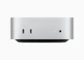 Mac mini in silver from the front with two USB-C ports and headphone jack