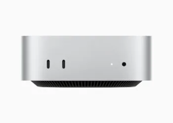 Mac mini in silver from the front with two USB-C ports and headphone jack
