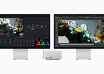 Mac Studio M5 Ultra between two Studio Displays running video editing and 3D software