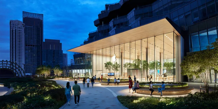 Symbolic image for Apple stock price target: Apple store in Bangkok at dusk