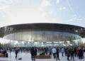 Crowd outside the glass Steve Jobs Theater at Apple Park; the iPhone 18 Pro event can be watched live worldwide