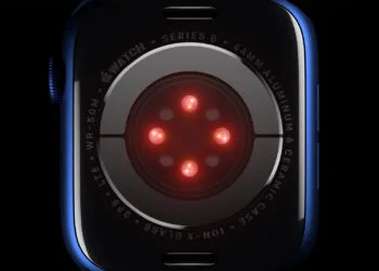 Apple Sonera acquisition: sensor array on the back of an Apple Watch Series 6 with glowing red diodes
