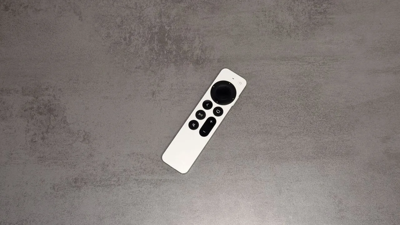 Siri Remote for the Apple TV 4K on a grey stone surface – for the code finding on the HomePod mini 2 and Apple TV 4K